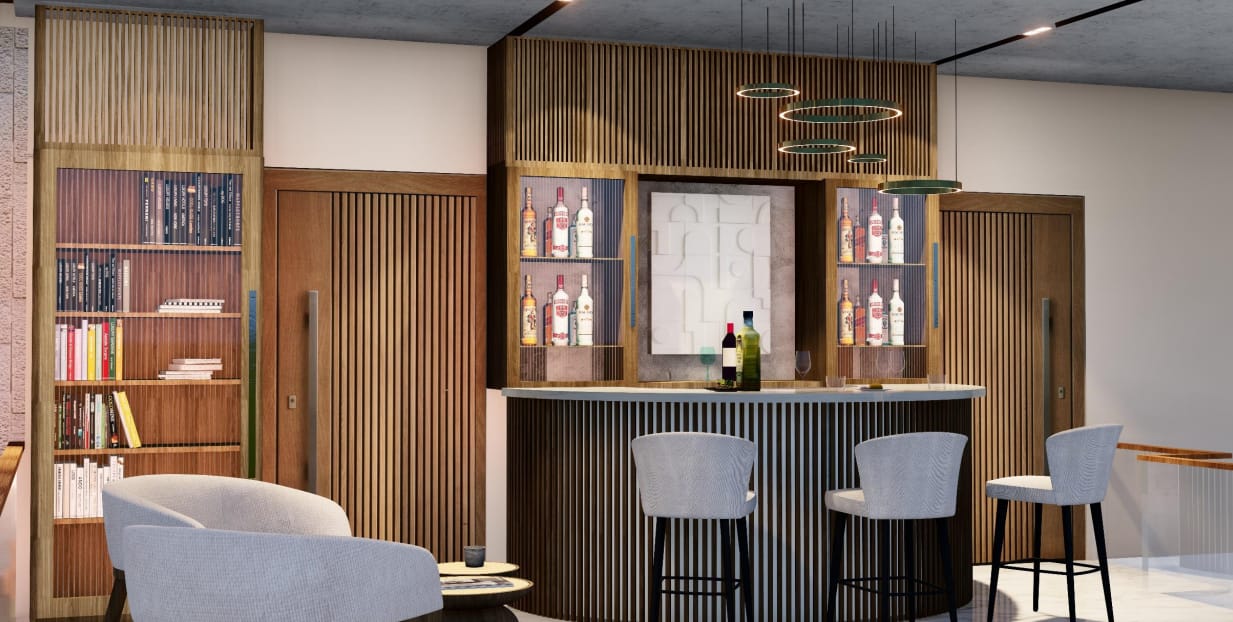 Home bar in fluted oak with backlit bottle display and bouclé bar stools