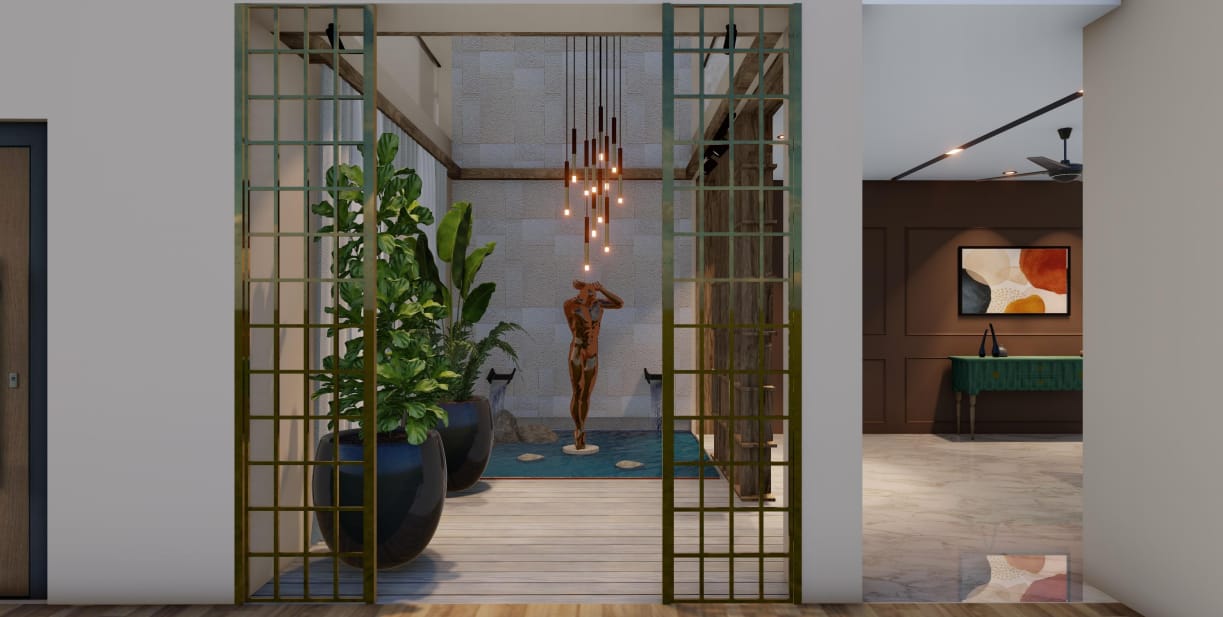 Indoor water court with brass trellis screens, planted urns and a sculpture under cascading pendant lights